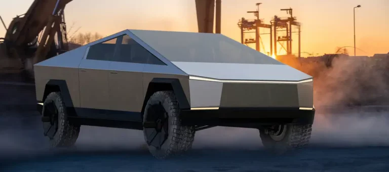 Cybertruck de tesla en un paisaje urbano industrial