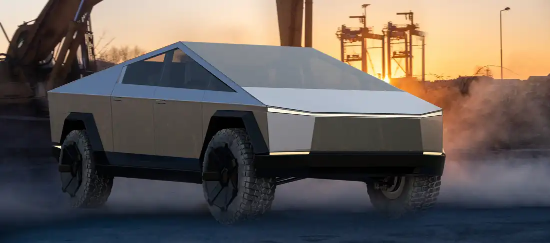 Cybertruck de tesla en un paisaje urbano industrial